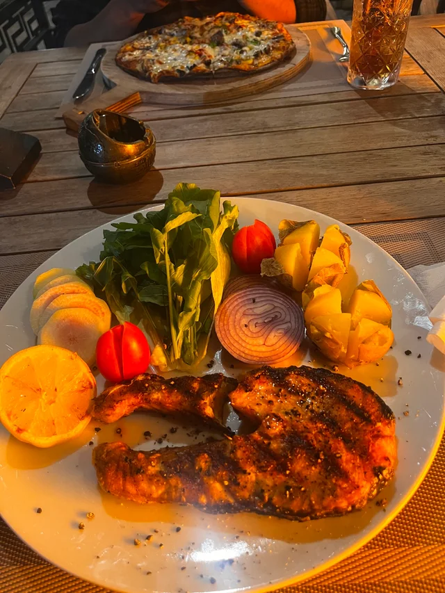 A grilled fish dinner from their first date