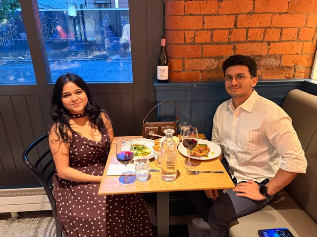 Akanksha in a polka dot dress and Kushal at her birthday dinner